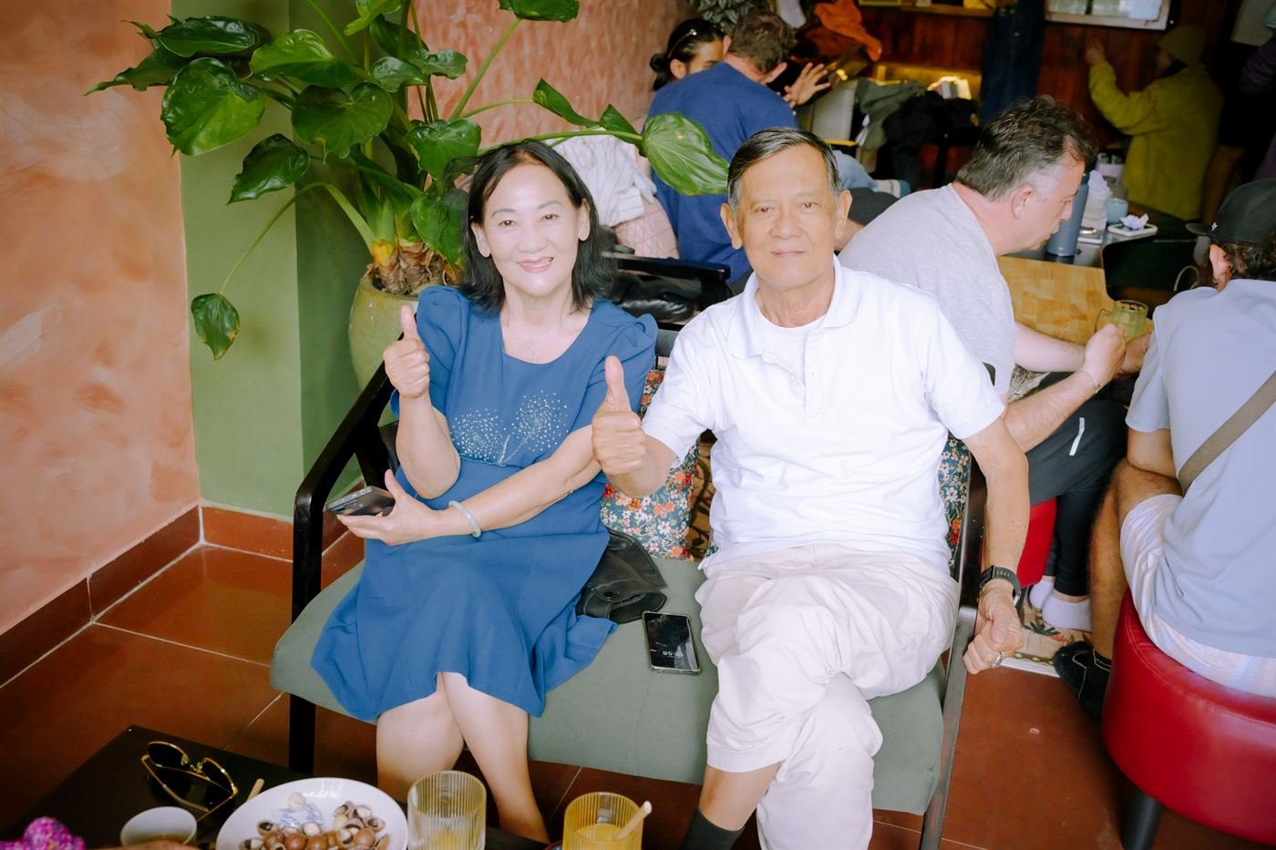 Happy guests giving a thumbs up