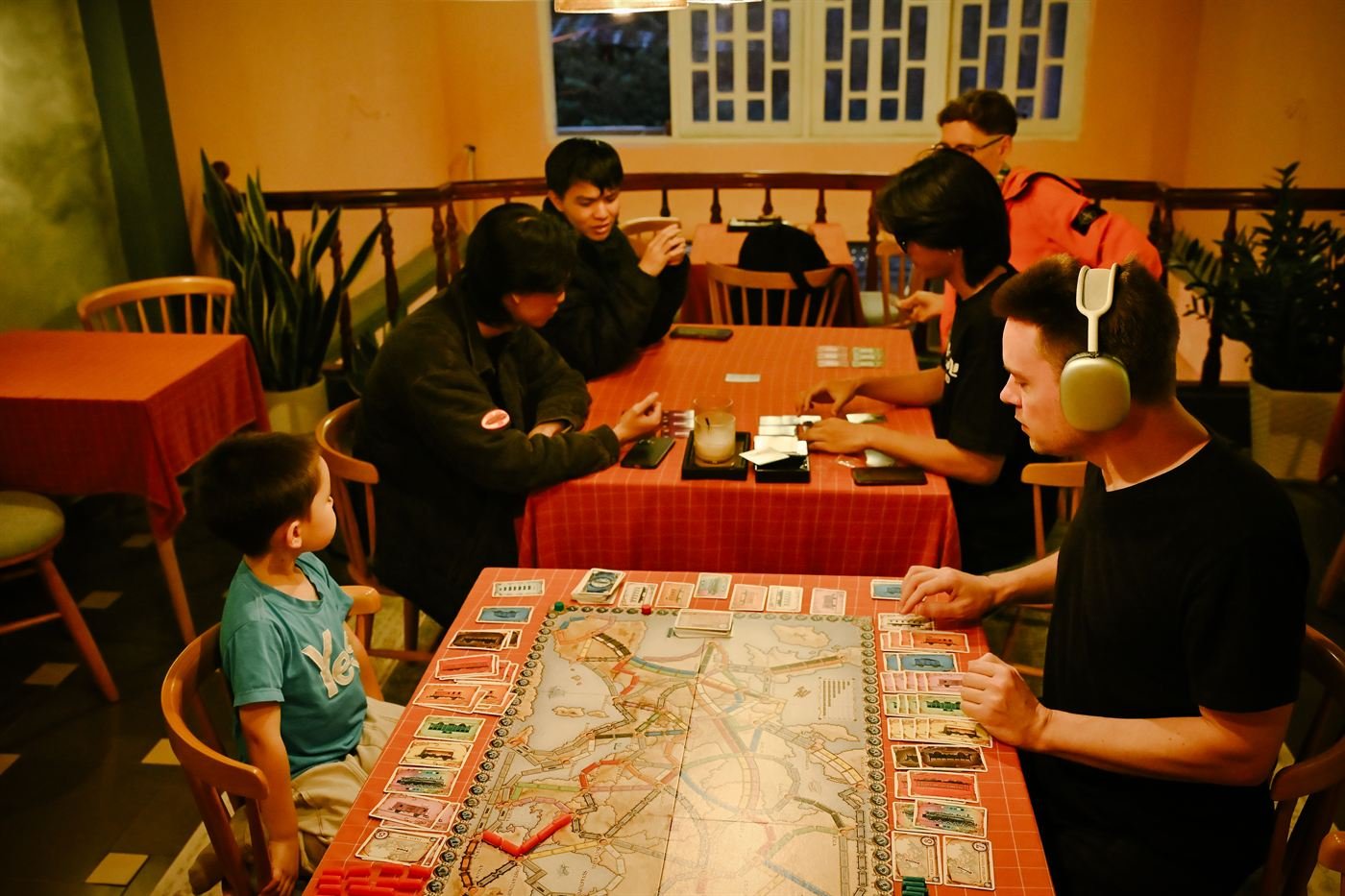 Big board game on a red tablecloth