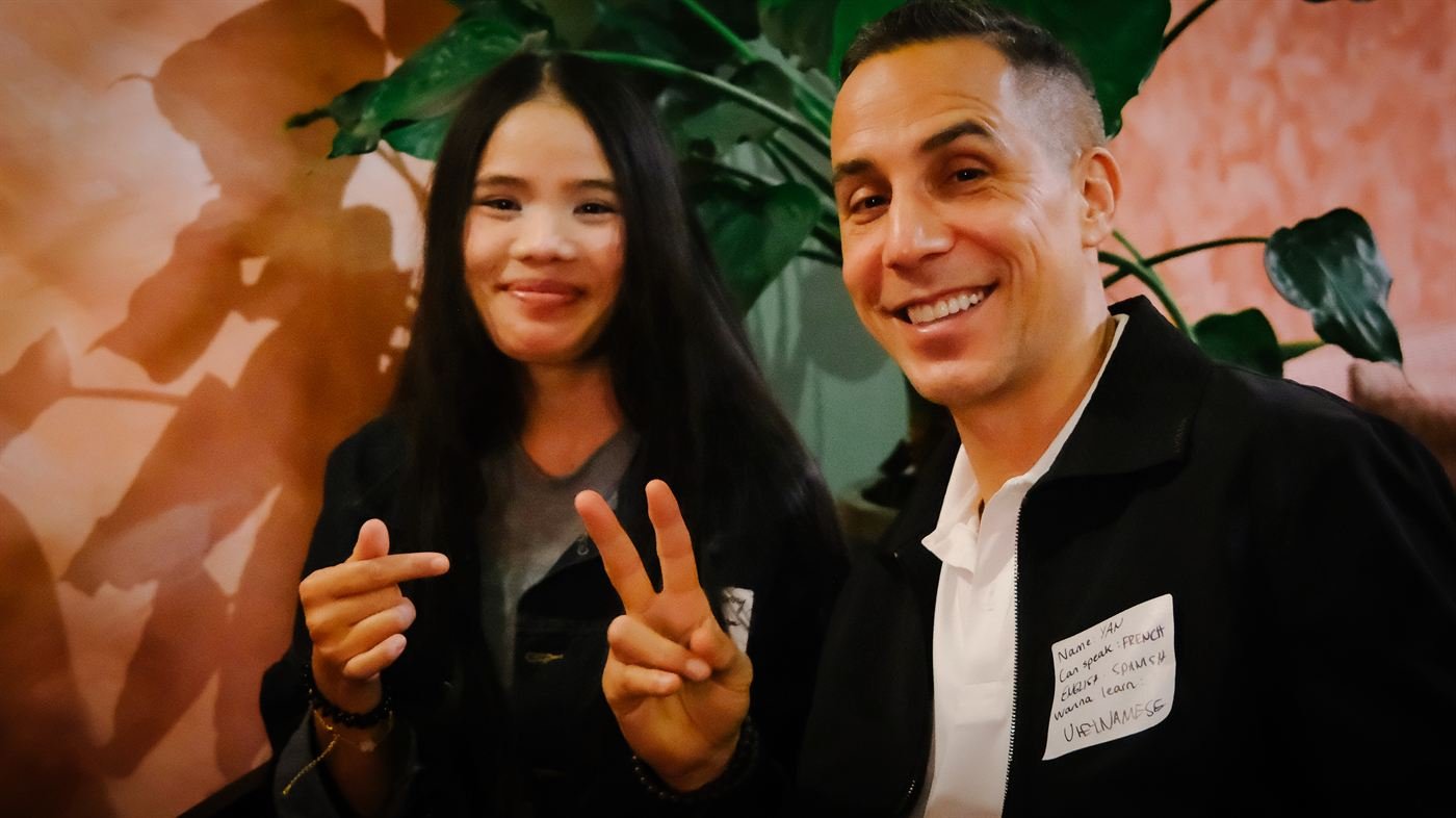 Two new friends making peace signs